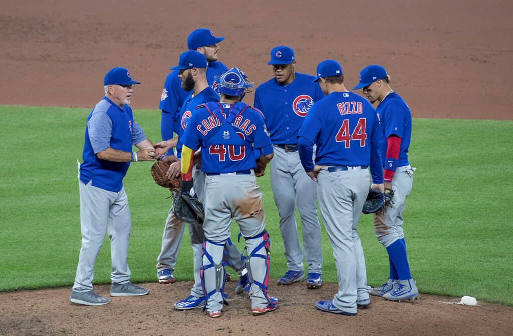 Manager of the Chicago Cubs talking to his team