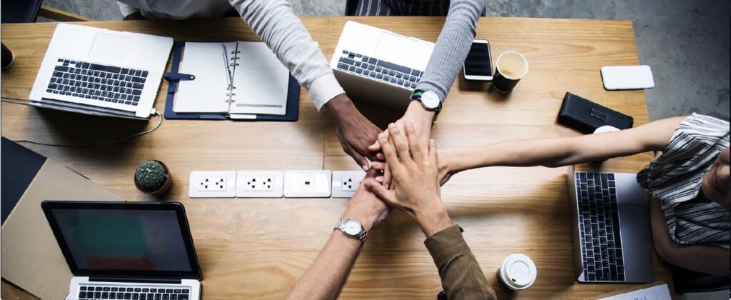 Decorative - Hands in for a meeting