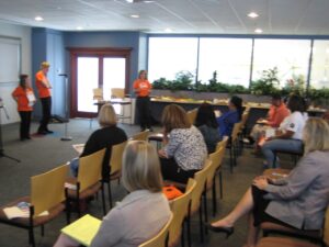 Bank staff watching a presentation on disability awareness